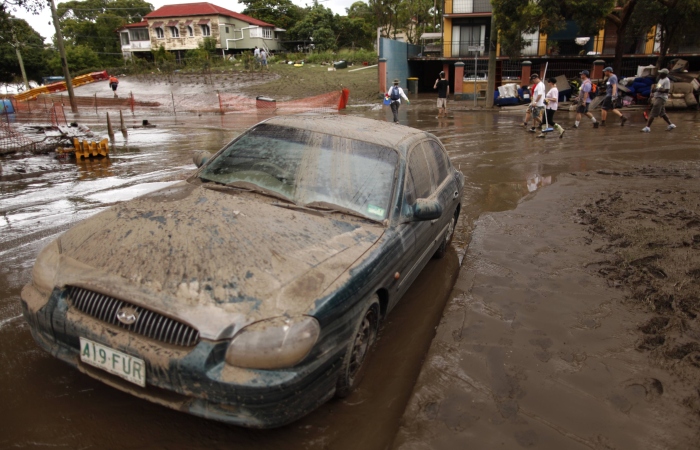 Mundo | Australianos pagarão até 1% de salário para reconstrução após enchentes