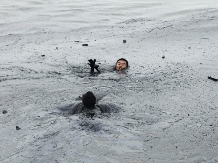 Jiang He/20.07.2010/Greenpeace/Reuters