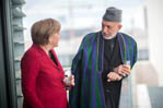 GUIDO BERGMANN / BUNDESREGIERUNG / AFP Angela Merkel recebe presidente do Afeganistão em Berlim