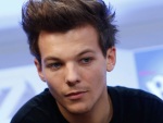 Louis Tomlinson fala <br>de briga entre bandas