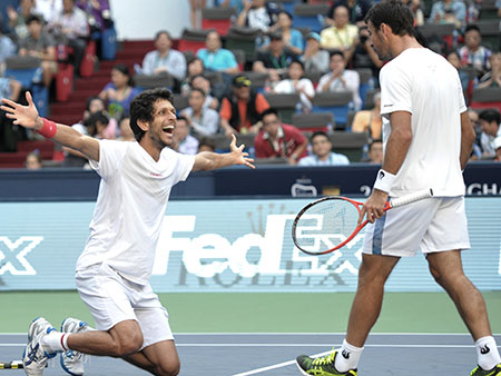 Marcelo Melo ganhou seu primeiro título ao lado do croata Ivan Dodig (AFP) marcelo melo 450